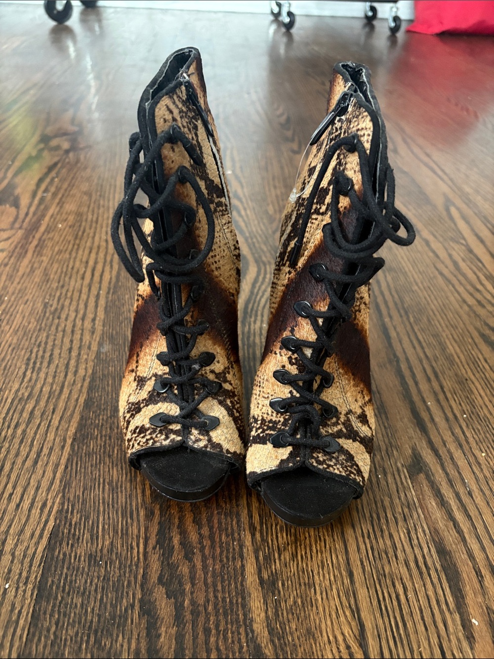 Sam Edelman "Karmen" Snake Print Calf Hair Booties.